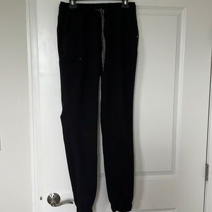 JAANUU Women's Essential 5-Pocket Jogger color black size Small Tall